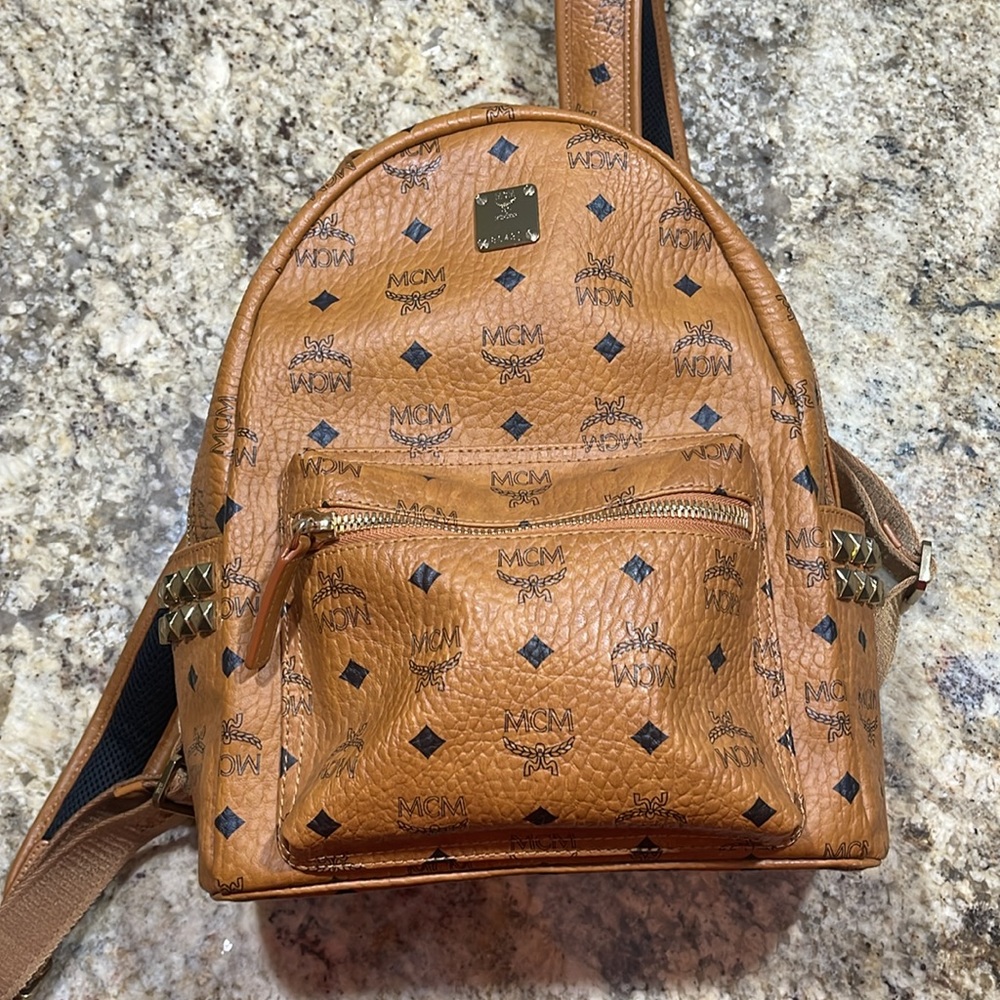 MCM studded cognac color backpack